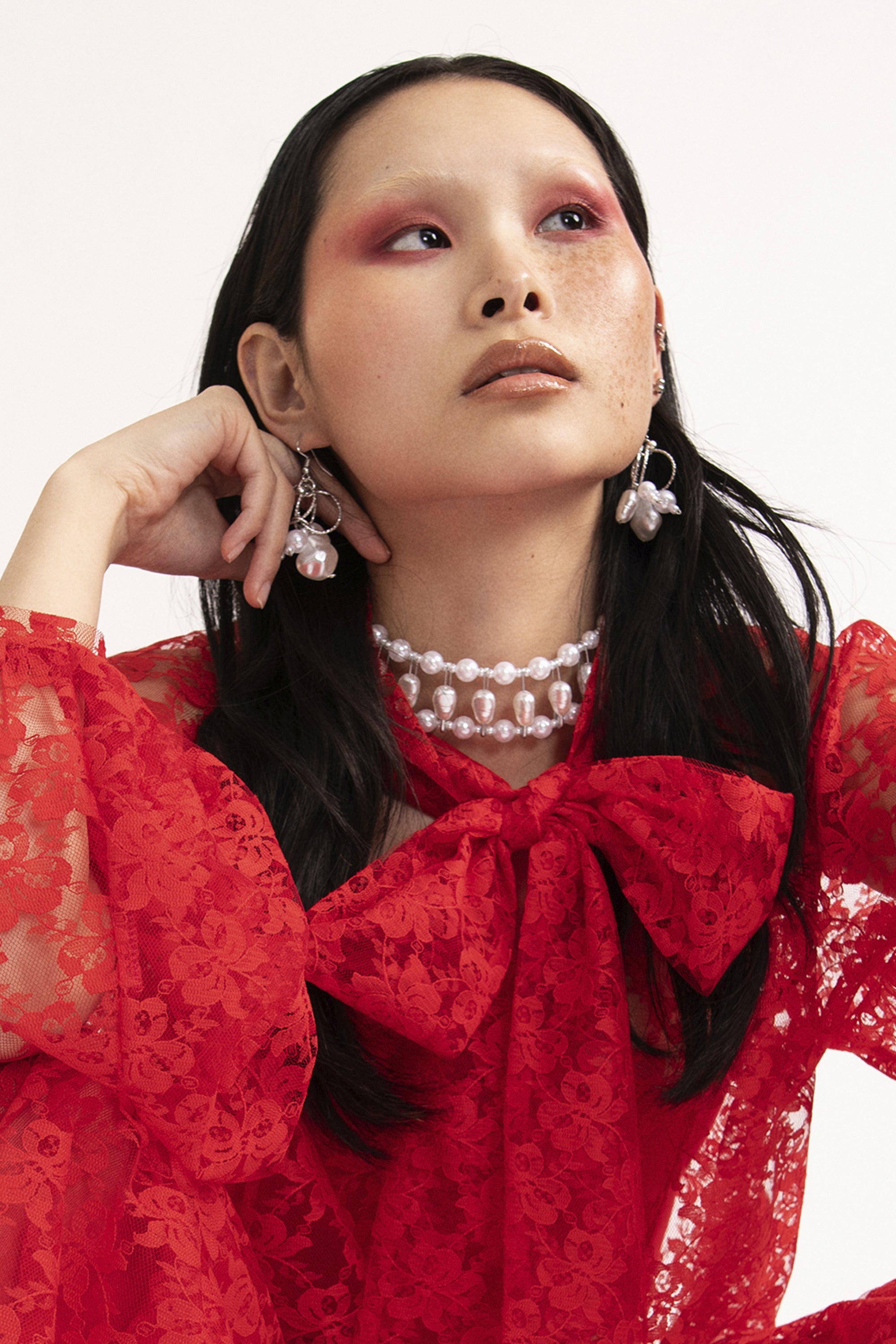 Mirkka Metsola Chandelier Earrings with silver detailing and light weight pearls.