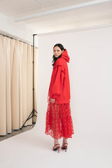 Mirkka Metsola Ruffle Hoodie in Red from the side. 