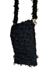 Back of the Mirkka Metsola Phone Bag in Shredded Black. 